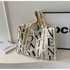 2025 Nova Bolsa de Lona Feminina Gentle Woman Grande Capacidade Bolsa de Ombro com Alça Larga Texturizada Bolsa de Ombro da Moda