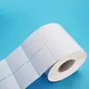 Fabricantes producen papel couché papel adhesivo para etiquetas papel para código de barras 50*40*5000 impresión de código bidimensional de dos filas