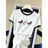 Camiseta de algodón para mujer de manga corta con diseño de hombros en contraste, única y elegante, ligera, nuevo modelo de verano 2026