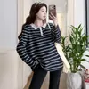 Ropa de Maternidad Otoño 2026: Top de maternidad con cuello de encaje patchwork a rayas simple, pantalones acampanados adelgazantes que cubren el abdomen