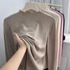 2025 primavera temprana nueva versión coreana de talla extra grande 300 kg rollo cuello medio alto camisa básica de punto mujer