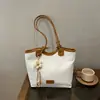 Bolso grande de mujer transfronterizo, nuevo estilo verano 2026, versátil y moderno, de un solo hombro, moderno, para la ciudad, retro, casual, tipo tote