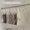 Camisola feminina leve, respirável e quente com acabamento escovado, apresentando algodão canelado elástico para um top básico versátil e que afina a silhueta.