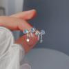 Nuevos pendientes de lazo colorido con diamantes brillantes, modernos pendientes femeninos con diseño de borlas de estrella y temperamento nicho.