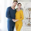 Ropa interior térmica nueva de Otoño e Invierno para hombre y mujer, traje de corte casual ajustado sin costuras, ropa interior térmica cepillada por ambos lados