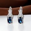 Pendientes de botón Shein transfronterizos nuevos de cristal de granate ovalado color oro champán para mujer, pendientes de temperamento, joyería simple y de moda