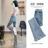 Pantalones acampanados con borde de pelo de color claro para mujer, cintura alta, adelgazantes, con borlas pequeñas, estilo mopa, jeans para primavera y otoño 2024