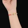 Pulsera de conejo de jade Hetian natural cuerda de mano tejida de ágata blanca diseño de nicho estilo chino cuerda roja para año de nacimiento