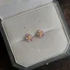 Mini aretes de flor de circón morado para el trayecto diario, aretes simples y versátiles para estudiantes para mujer, cadena de suministro de fábrica