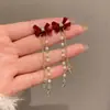 Pendientes de Lazo Super Hada con Terciopelo Rojo, Pendientes Largos con Borla Femeninos Estilo Año Nuevo de Gama Alta Adelgazantes Venta al por Mayor