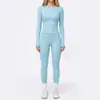 Conjunto de yoga de dos piezas sin costuras de cuello redondo y manga larga, transfronterizo europeo y americano, con pantalones de fitness ajustados de cintura alta que levantan los glúteos