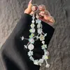 Cadena de cuentas de moda con hexagrama de aleación y pedrería, llavero de teléfono con racimo floral de cristal de nicho