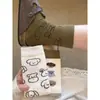 Série de ilustrações preguiçosas de outono e inverno estilo designer meias fofas de coelho de desenho animado japonês com uma vibe jovem
