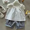 Conjunto de Ropa para Bebés y Niños Pequeños 2026 Verano Nuevo Estilo Coreano Moda Camisola para Bebé y Pantalones Cortos para Niñas Conjunto de Dos Piezas