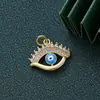 Colgante de joyería de ojo de diablo con incrustaciones de diamantes nuevo transfronterizo llavero DIY mochila colgante Joker en stock al por mayor