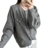 Cárdigan de punto con bloques de color estilo tweed color mapache para mujer, nueva colección otoño/invierno 2026, suéter de manga larga con bolsillos falsos