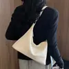 Bolso de axila para mujer 2026 nuevo de moda de verano moda de alta gama nicho súper popular bolso de hombro bolso cruzado para commuting