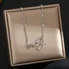 Europa y Estados Unidos transfronterizo súper ventas collar de cuerpo completo de acero de titanio para mujer sensación de alta calidad temperamento chapado 18K cadena de clavícula joyería no se decolora