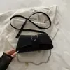 Bolsa de mão pequena fosca de alta qualidade para mulheres, nova bolsa de ombro versátil e da moda para o dia a dia 2026, bolsa transversal de luxo leve e estilosa