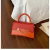 Bolso de Mano para Mujer Verano 2025 Nuevo Bolso Cuadrado Pequeño Transfronterizo con Acabado de Alta Gama, Bolso Cruzado Versátil, Bolso Pequeño de Moda
