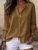 1688 exclusivamente para Europa y EE. UU.: Colección otoño 2026, camisa de algodón y lino color beige, corte holgado, cuello en V, con mangas enrollables, top de longitud media