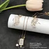 Conjunto de pendientes y collar Xuping estilo vintage de nicho europeo y americano transfronterizo, conjunto de joyería elegante de aleación de cobre, venta al por mayor y hecho a medida