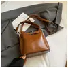Bolso cubo transfronterizo, bolso cruzado de lujo ligero para mujer, bolso de mano de gran capacidad estilo coreano moderno, bolso de hombro de diseño de nicho retro