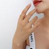 Anillo de acero de titanio con diseño único de costura geométrica hueca de Europa y Estados Unidos, chapado en oro real 18, joyería.