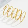 Pulsera de acero inoxidable dorada transfronteriza, traje de pulsera de trébol de cintura pequeña con tachuelas, brazaletes dorados
