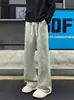 Pantalones deportivos transfronterizos estilo americano para hombre, marca de tendencia nueva otoño/invierno, diseño de corte inclinado, efecto de alargamiento de piernas, pantalones casuales rectos adelgazantes