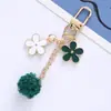 Ins estilo japonés flor de cerezo llavero colgante corazón de chica linda hueco cadena de teléfono funda para auriculares decoración de bolsa