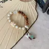 Pulsera de Cerámica Jingdezhen Nuevo Estilo Chino Cuerda Trenzada Simple de Cerámica Joyería Artesanal con Cuentas Literaria y Artística Fresca y Versátil