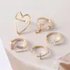 Anel aberto em forma de coração de design de nicho de alta qualidade, luxo leve, conjunto de cinco peças de anel personalizado da moda europeia e americana cravejado de diamantes