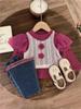 Venta al por mayor de ropa infantil transfronteriza Trajes para niñas Primavera y otoño Nuevo Conjunto de tres piezas para niños: chaleco de flores, camisa básica y jeans