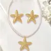 Europa y Estados Unidos transfronterizo nuevo traje estilo playa collar de perlas artificiales y estrellas de mar, aretes de estrella de mar de alta gama un par