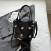 Bolso de mano de gran capacidad con textura de alta calidad para mujer, nuevo bolso de hombro de viaje de moda de otoño 2024, bolso tipo cubo