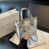 Bolso de cubo popular de este año para mujer, nuevo bolso pequeño colgante de verano 2025 para todo tipo de combinaciones, bolso pequeño de trabajo portátil explosivo