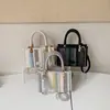 Bolso de mujer de alta gama 2026 verano nuevo bolso de hombro a rayas para el día a día, diseño de nicho moderno y simple