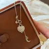 Collar de Segunda Mano de Lujo Ligero con Corazón de Zirconia, Luna y Borla para Mujer, Cadena de Cuello de Gama Alta, Única y de Moda, Cadena para Clavícula