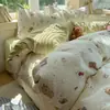 Juego de ropa de cama de cuatro piezas de algodón 100% clase A para dormir sin ropa, funda de edredón de algodón puro con estampado de dibujos animados fresco y lindo estilo ins, juego de tres piezas para dormitorios de estudiantes