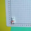 Coelho Fofo Sentado de Desenho Animado Usando Cachecol Resina DIY Capa de Celular Elástico de Cabelo Acessório de Cabelo Fivela de Sapato Material Acessórios Atacado