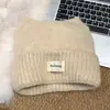 Gorro de punto lindo estilo coreano con orejas de gato para mujer, cálido y protege los oídos para el invierno, hace que la cara se vea más pequeña, gorro versátil para poner sin cierre