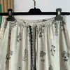 Pantalones Anchos de Algodón y Lino Estampados Estilo Étnico para Mujer Verano Temperamento Reductores de Edad Culottes con Dobladillo de Volantes Pantalones Casuales de Algodón y Lino de Cintura Alta Retro