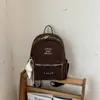 Nueva Mochila Estudiantil de Alto Valor Mochila Estudiantil de Gran Capacidad Estilo Coreano Bolsa de Doble Hombro Estrella Bolsa de Doble Hombro con Bordado de Letras
