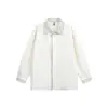 Yidao Vintage 2026 Primavera Nova Camisa Listrada com Gola Reversível de Manga Longa Marca Tendência Corte Solto Versátil Casual para Casal