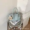 Bolso de mano pequeño vintage de alta gama para mujer, bolso cruzado versátil de nueva moda, bolso exquisito y súper popular