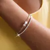 Pulsera Abierta de Zirconia de Doble Capa con Lazo, Simple y Elegante, Diseño de Nicho, Pulsera de Gama Alta, Joyería Retro Europea y Americana