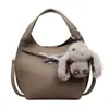 Bolso de mano de alta gama y elegante, nuevo bolso cruzado versátil de moda para mujer 2026, bolso tote tipo cubo pequeño de color liso