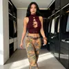 26 estilos de tops sexy de rejilla huecos para chicas calientes, de malla transparente versátiles para discoteca, disponibles en stock, venta al por mayor, tops ajustados y camisetas sin mangas
