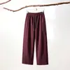 Calça feminina casual de outono de alta qualidade, cor sólida, perna larga, com cordão elástico na cintura, feita de tecido de seda de leite, modelagem solta e elegante.